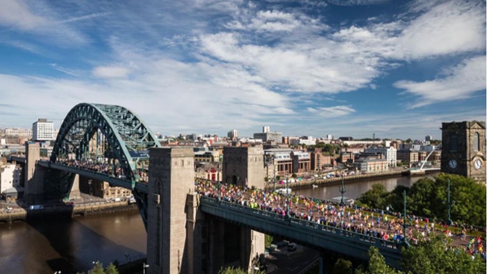 Runners cross the Tyne Bridge in the Great North Run.
