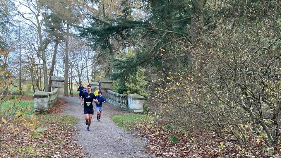 Running across the Roman Bridge at the Weston Park 10K