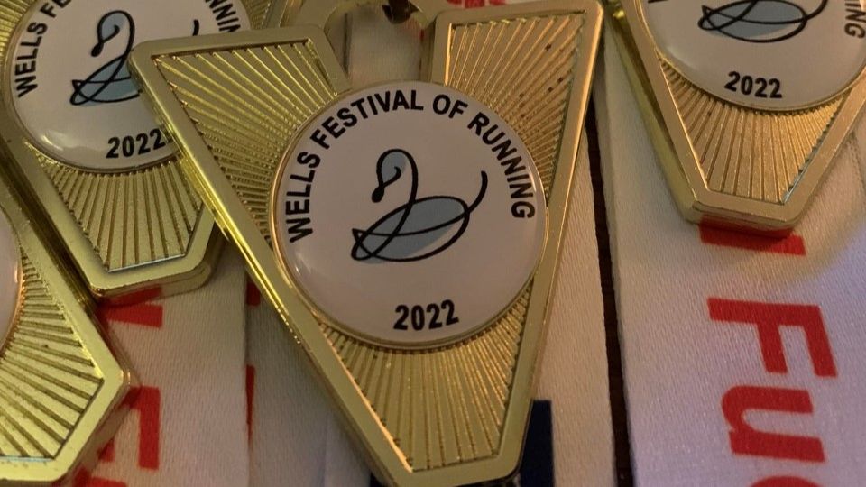 /images/2022/09/wells-festival-of-running-medals-926956.jpg