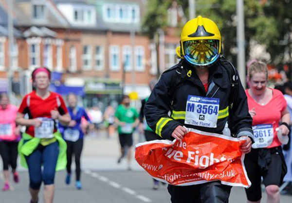 Runner in fire fighter gear