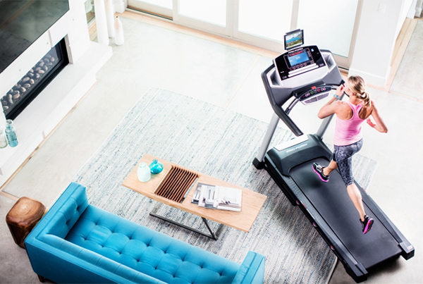 lifestyle shot of runner on treadmill at home