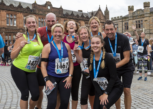 Paisley 10K finishers show off their medals