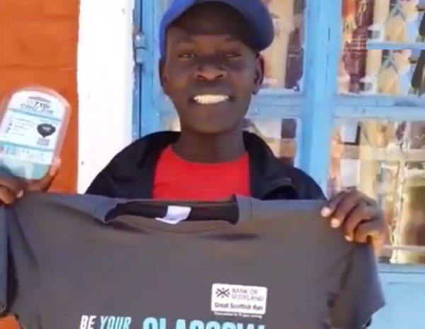 Happy Kenyan with a new T-shirt