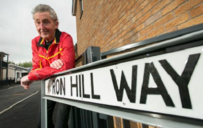 Ron Hill at street sign