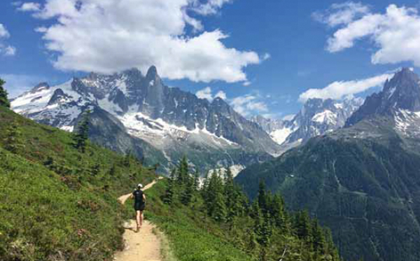 runner going across an Alpine pass